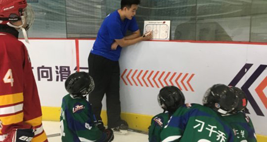 UVic student coaching young Chinese hockey players