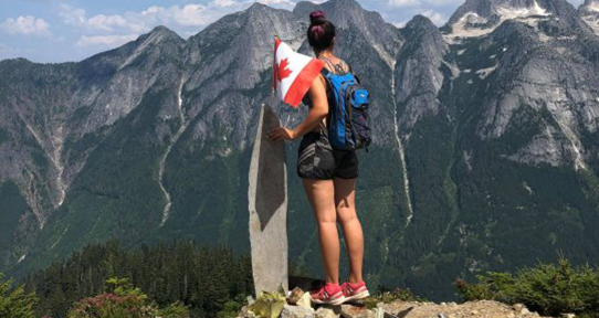UVic student on a mountaintop