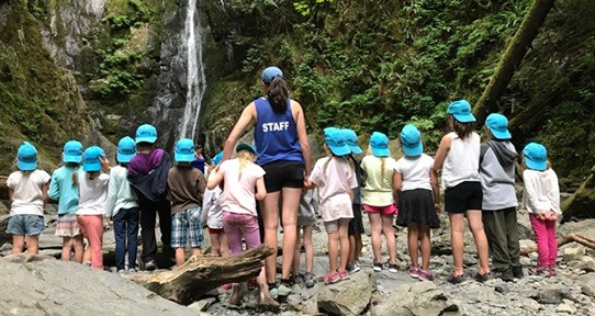 An EPHE student with kids at Goldstream provincial park