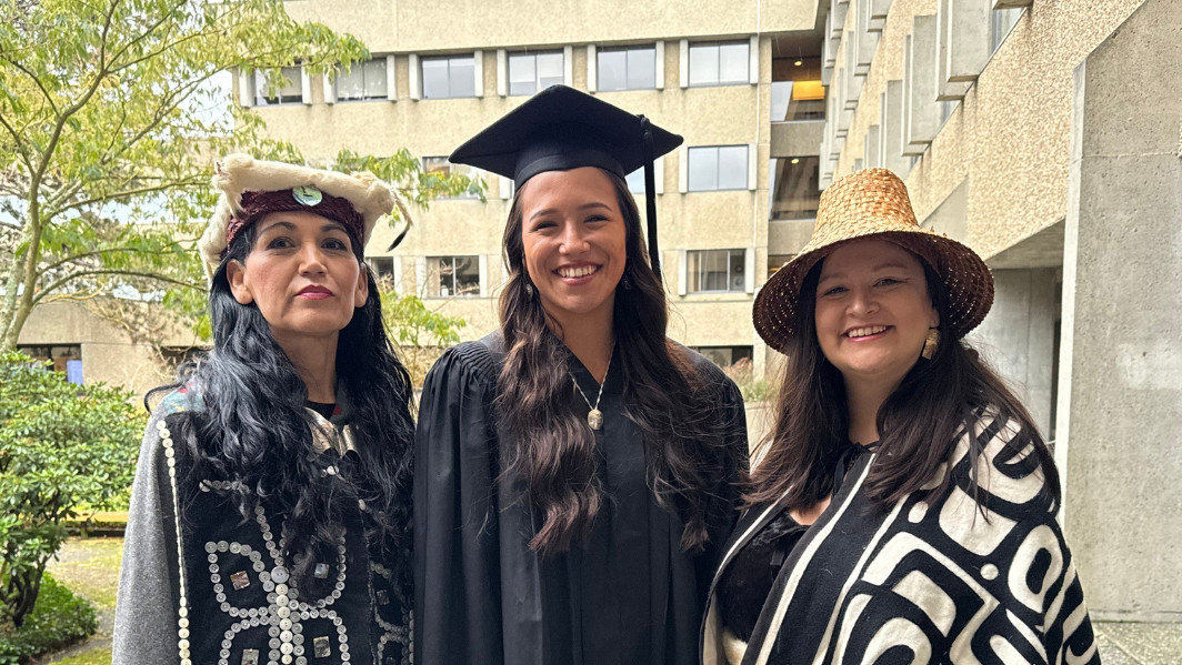Three CILP graduates on campus for graduation.