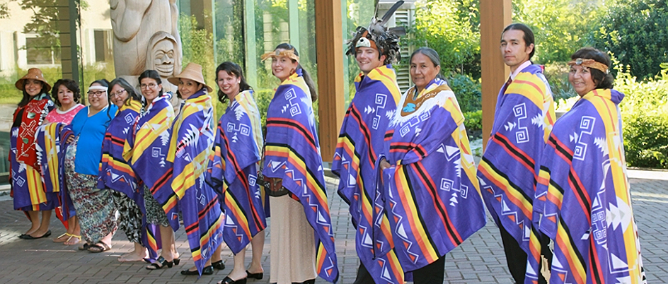 Graduate students blanketed and lined up outside the First Peoples House