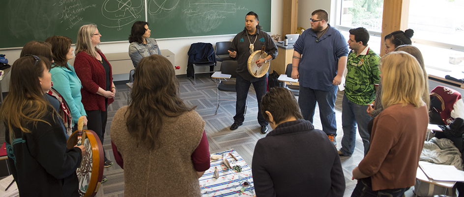 An Indigenous teacher leading a classroom session