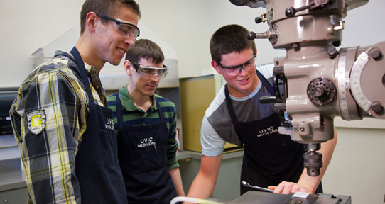 Undergraduate students in department machine shop