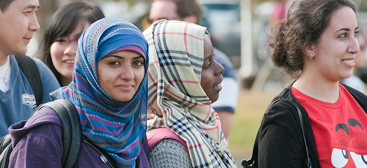 Woman smiling with others