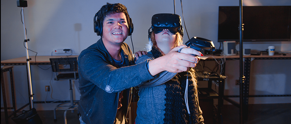 Two students using a virtual reality set