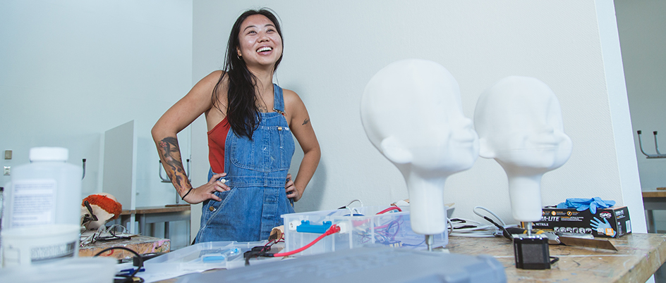 Visual Arts student Xiao Xue in an art studio