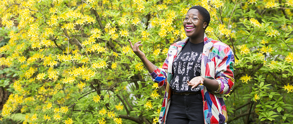 K.P Dennis in front of flowers