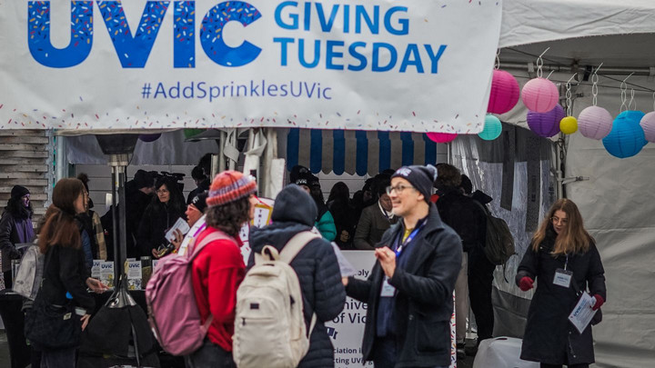 Students and volunteers playing Giving Tuesday games