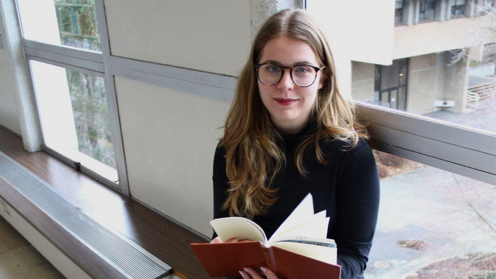 Holly reading a book