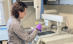 Student using lab equipment