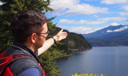 Nathaniel standing by lake