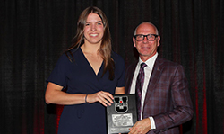 Zoe receiving an award