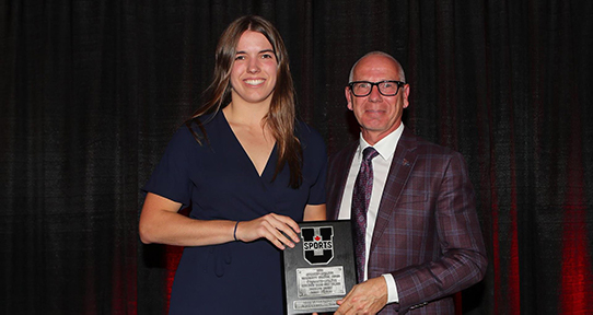 Zoe receiving an award