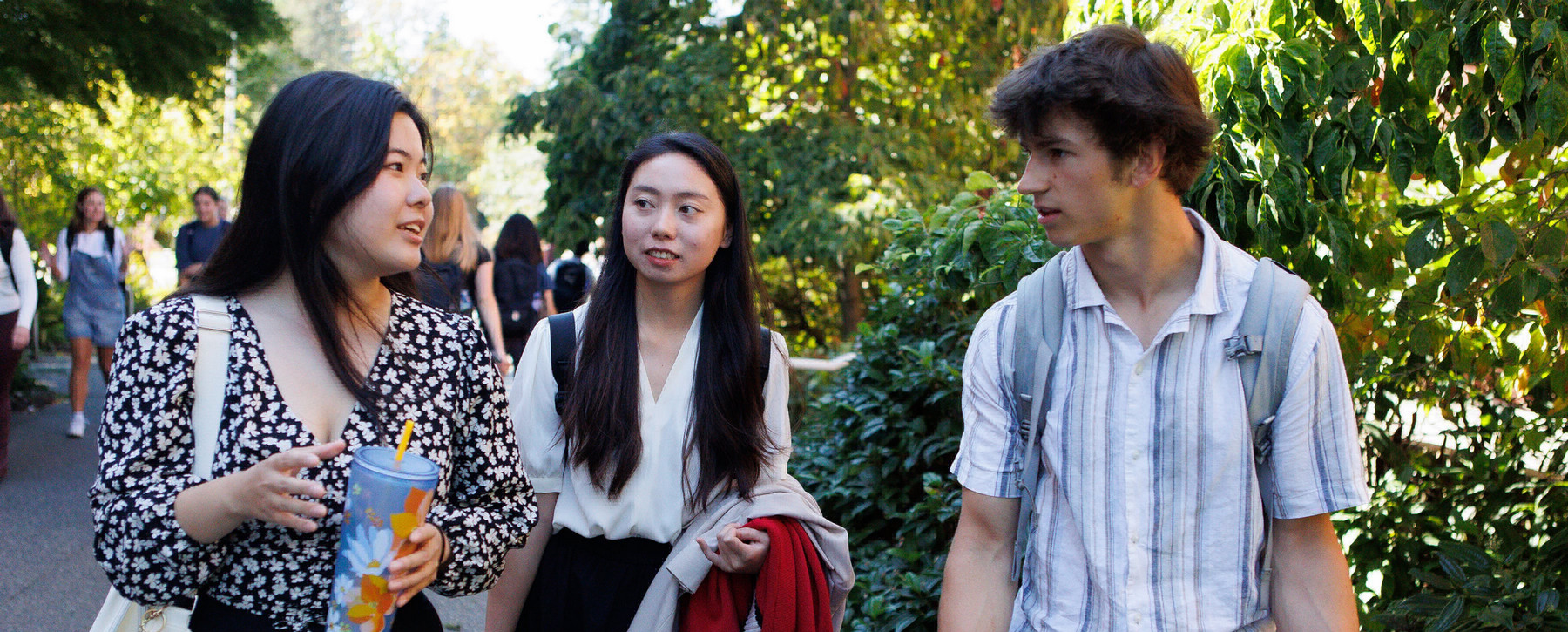 Three students walking to class