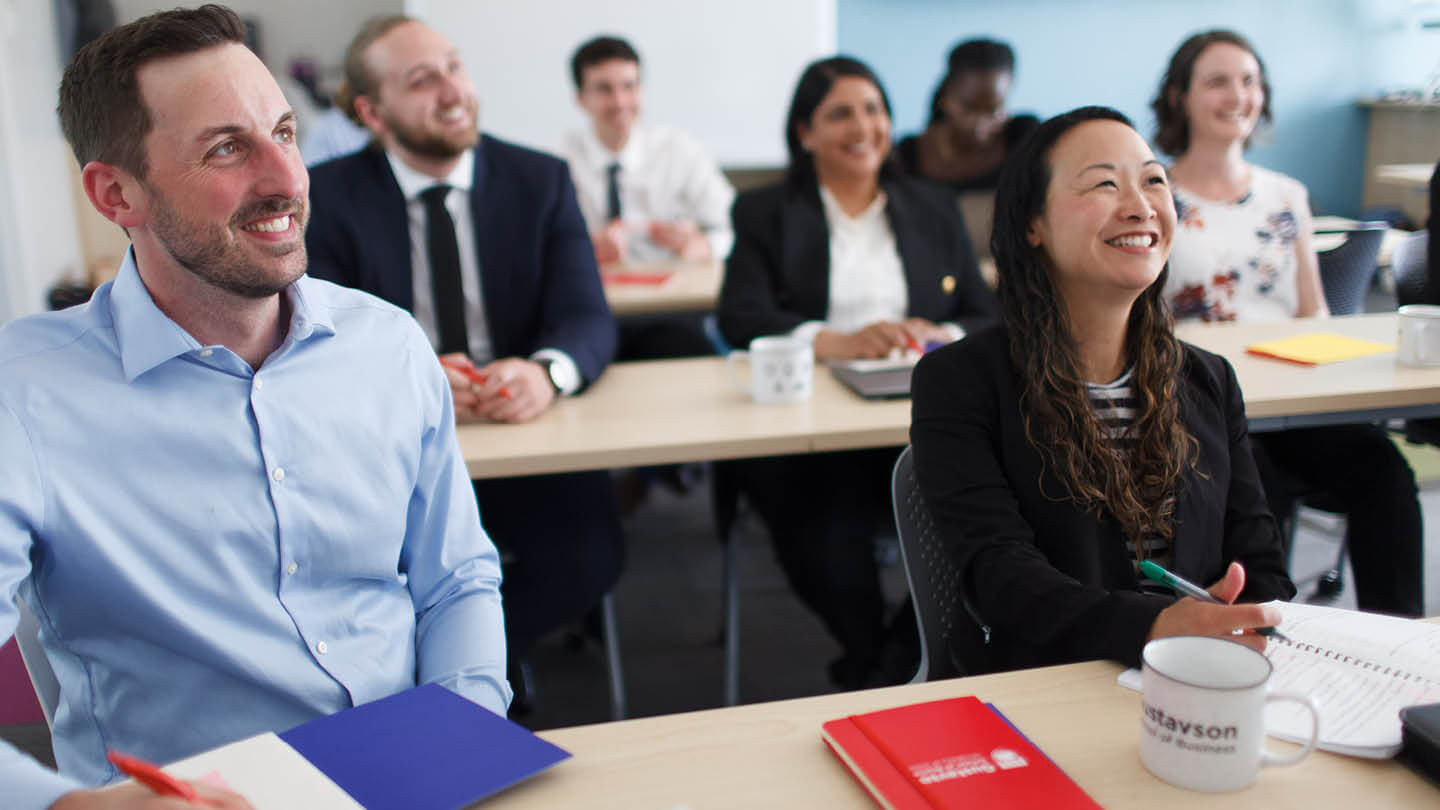 MBA class in session sitting at desks