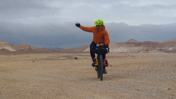 Felipe Ferreira riding his bicycle on his cycling trip
