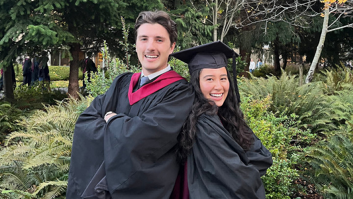 Hiroko Mahoney and Aidan Bamford in the convocation robes