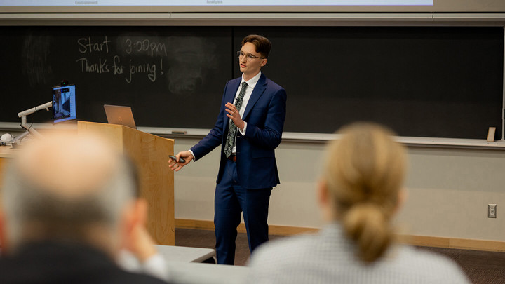 Jack DesBrisay speaking at the AIMC presentations