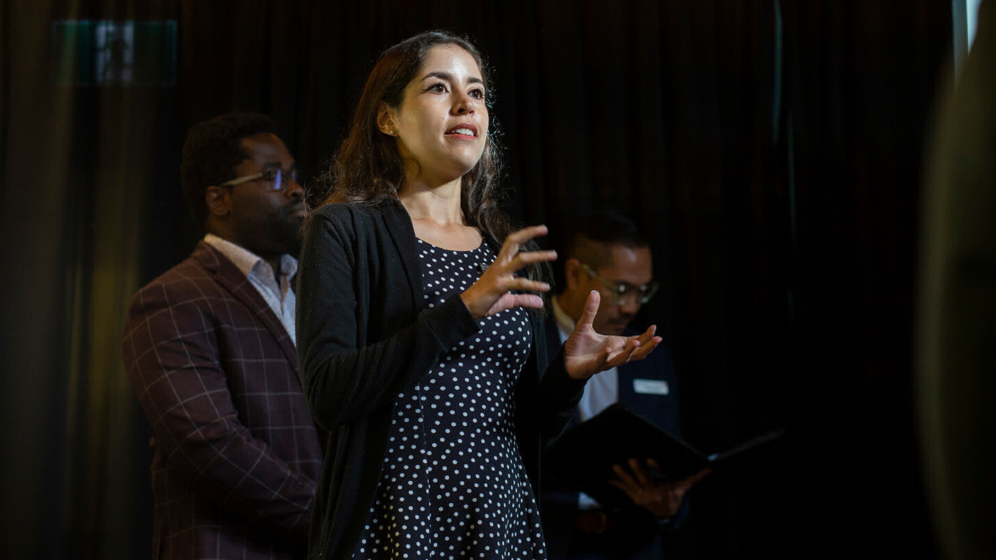 MBA student Jessica Garcia presents with her group