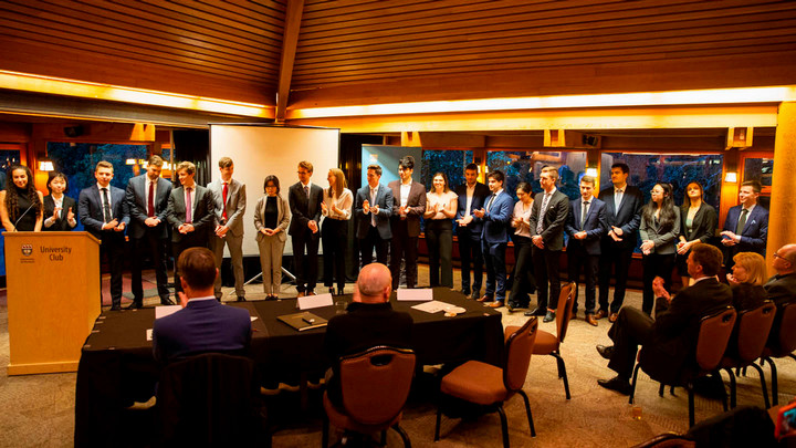 All participants of the RBC Case Competition stand up front together