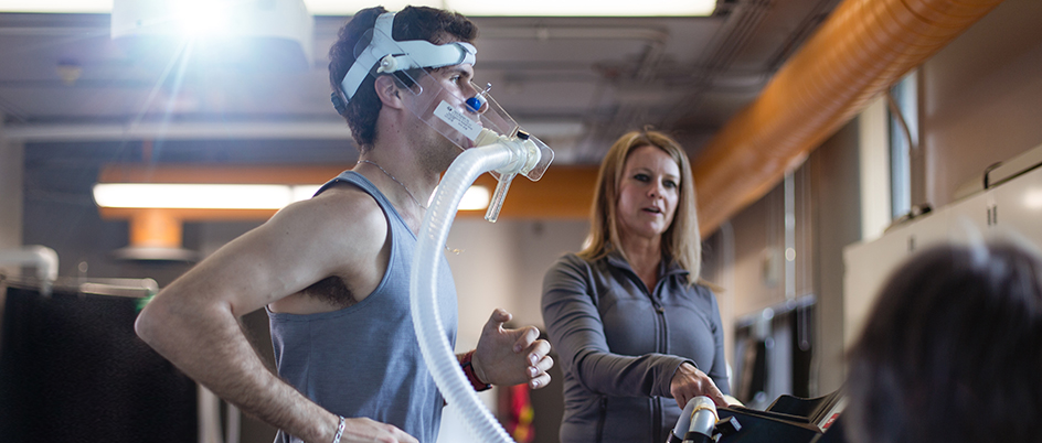 Person running on a treadmill for a research experiment 