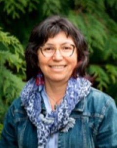 Dr. Leanne Kelly wearing a denim jacket