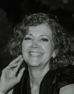 Black and white portrait of Kelly McInerney 