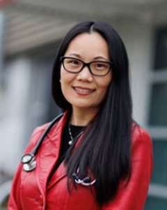 Dr. Sarah Pirani wearing a red leather jacket