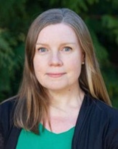 Louise Thornton wearing a green blouse