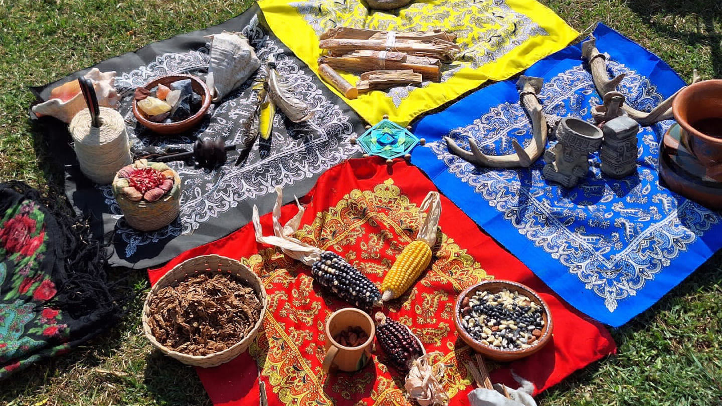 Honoring the pluriverses. This altar, at a gathering in Mexico City, features colors that symbolize the four cardinal directions. Interestingly, these colors vary across different Indigenous traditions.
