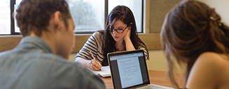 Students studying at a table