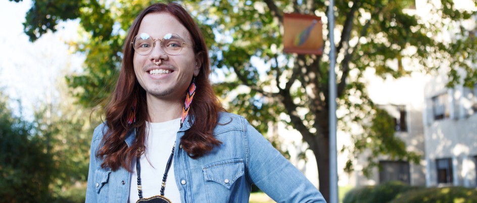 Michael Chutskoff smiles on campus at UVIc