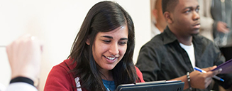 UVic student reading in a classroom