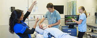 Students learning in a hospital room