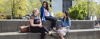 Students hanging out at the UVic fountain