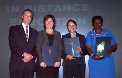 Left to right: Sir John Daniel of the COL, and Category B winners Theresa Schindel, University of Alberta, Maggie Kovach, UVic, and Ms. Frances Jerry Ferreira, Namibian College of Open Learning.