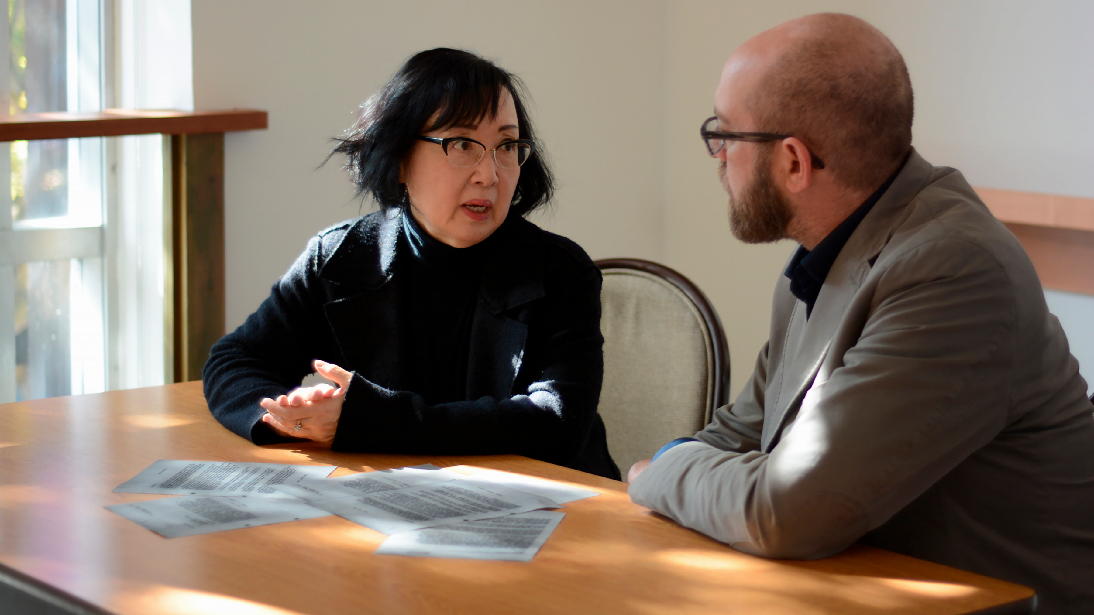 Sherri Kajiwara, director and curator of Nikkei National Museum, and Jordan Stanger-Ross, UVic historian and project director, with some of the 300 letters now part of Landscapes of Injustice project.