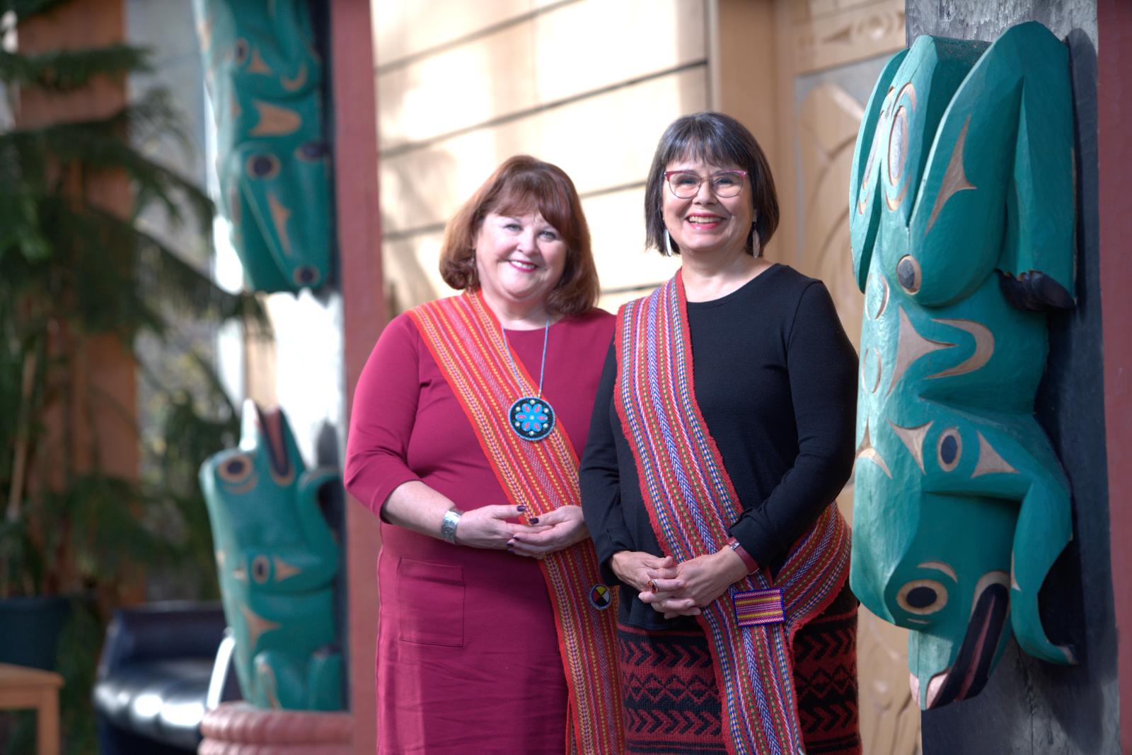 Jeannine Carriere (Social Work) and Christine Welsh (Gender Studies) standing inside of the First Peoples House. Photo Credit: UVic Photo Services.