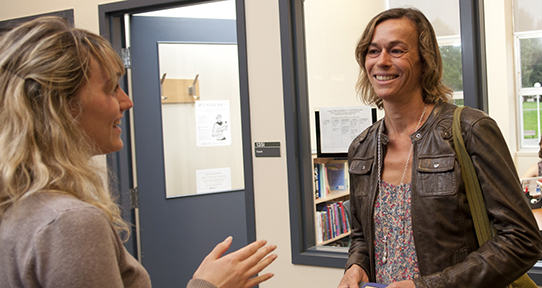 Catherine Caws with student at the French Language Centre