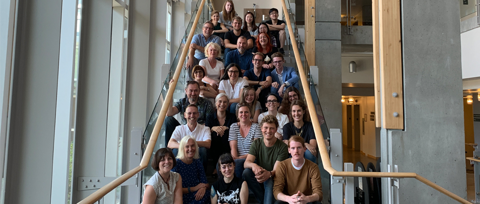 Faculty, staff and students on the stairs