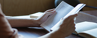 Student reading a book