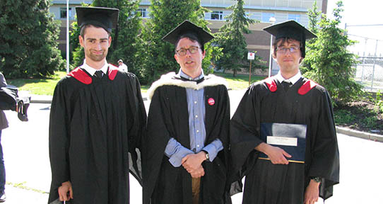 Professor Gregory Rowe in between Honours student Nick Falzon and Vincent DesForges.