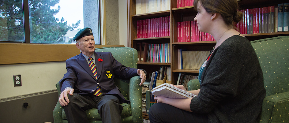 Student interviewing a veteran