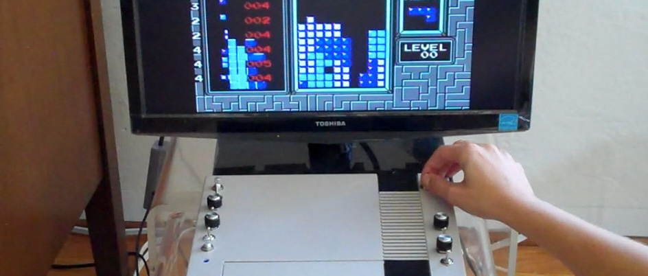 a circuit-bent Nintendo used to play Tetris on a small tv screen