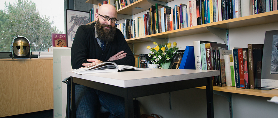 Warren Olmstead in an office