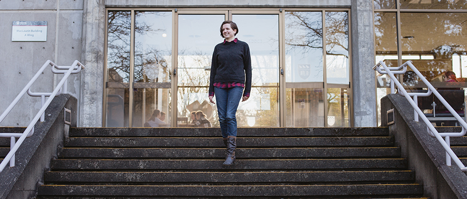 Student walking down UVic building steps