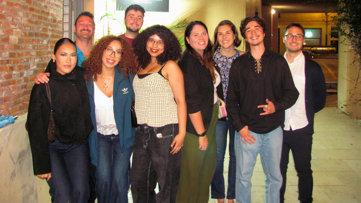UVic students taking a group photo indoors while going out for the night in Alcalá de Henares