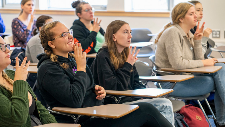 Students in an ASL class at UVic practice signing.