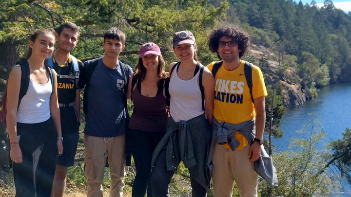 a group of UVic students poses for a photo after hiking to Thetis Lake
