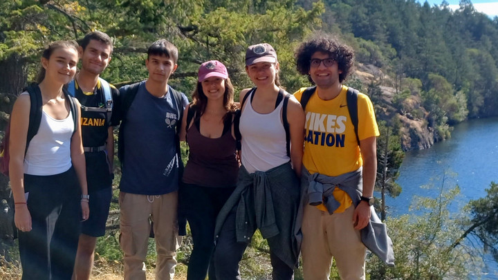 a group of UVic students poses for a photo after hiking to Thetis Lake